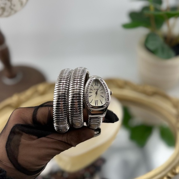 Elegant silver-tone wrap watch in the famous luxury Serpenti style - Picture 1 of 17
